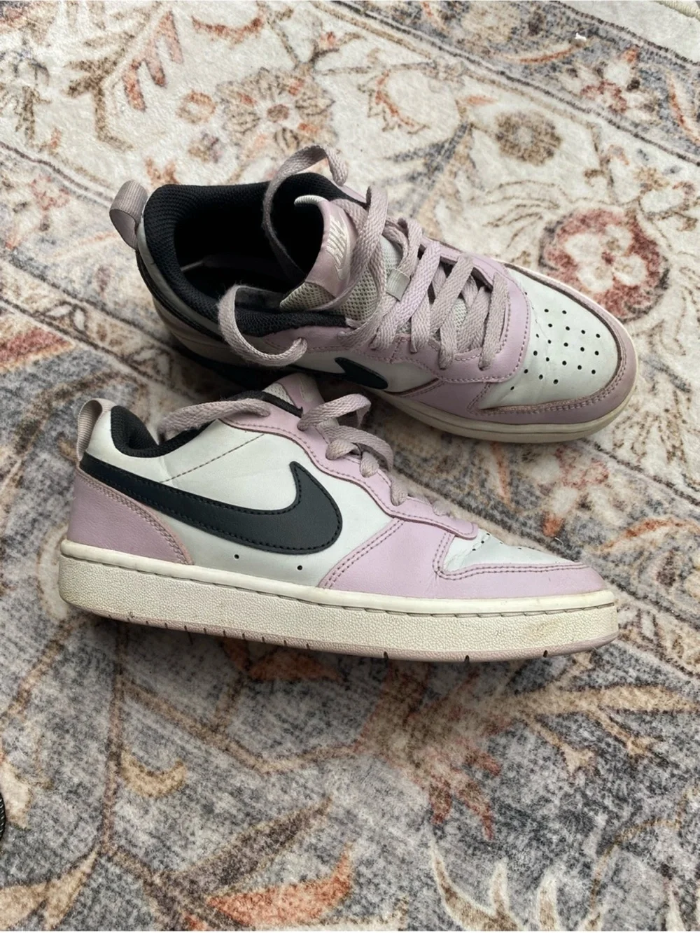 Nike Low-Top Sneakers in Light Pink, White and Black Swoosh